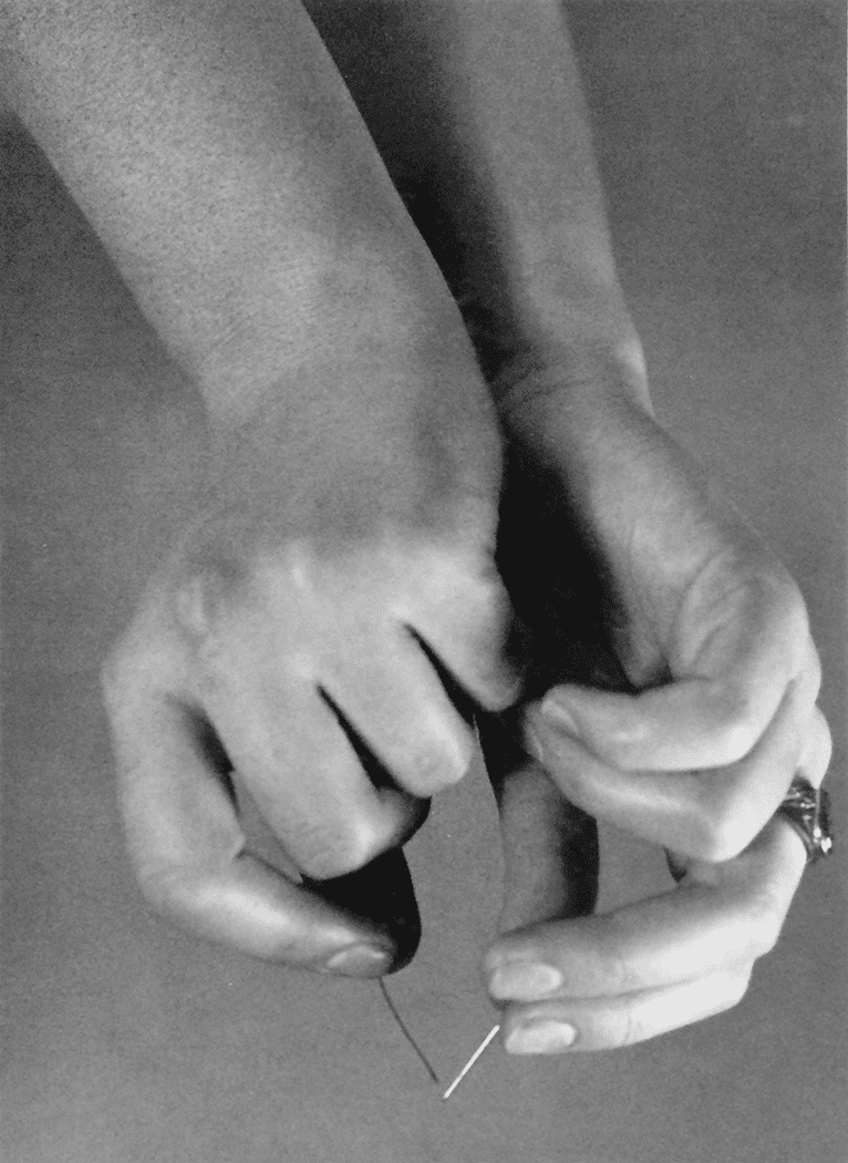 Lucia Moholy. Hands Peeling Potatoes. C. 1930. image